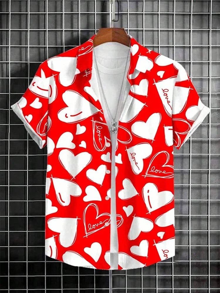 Red short sleeve button-up shirt with white love hearts and 'love' text pattern, hanging on a grid wall.