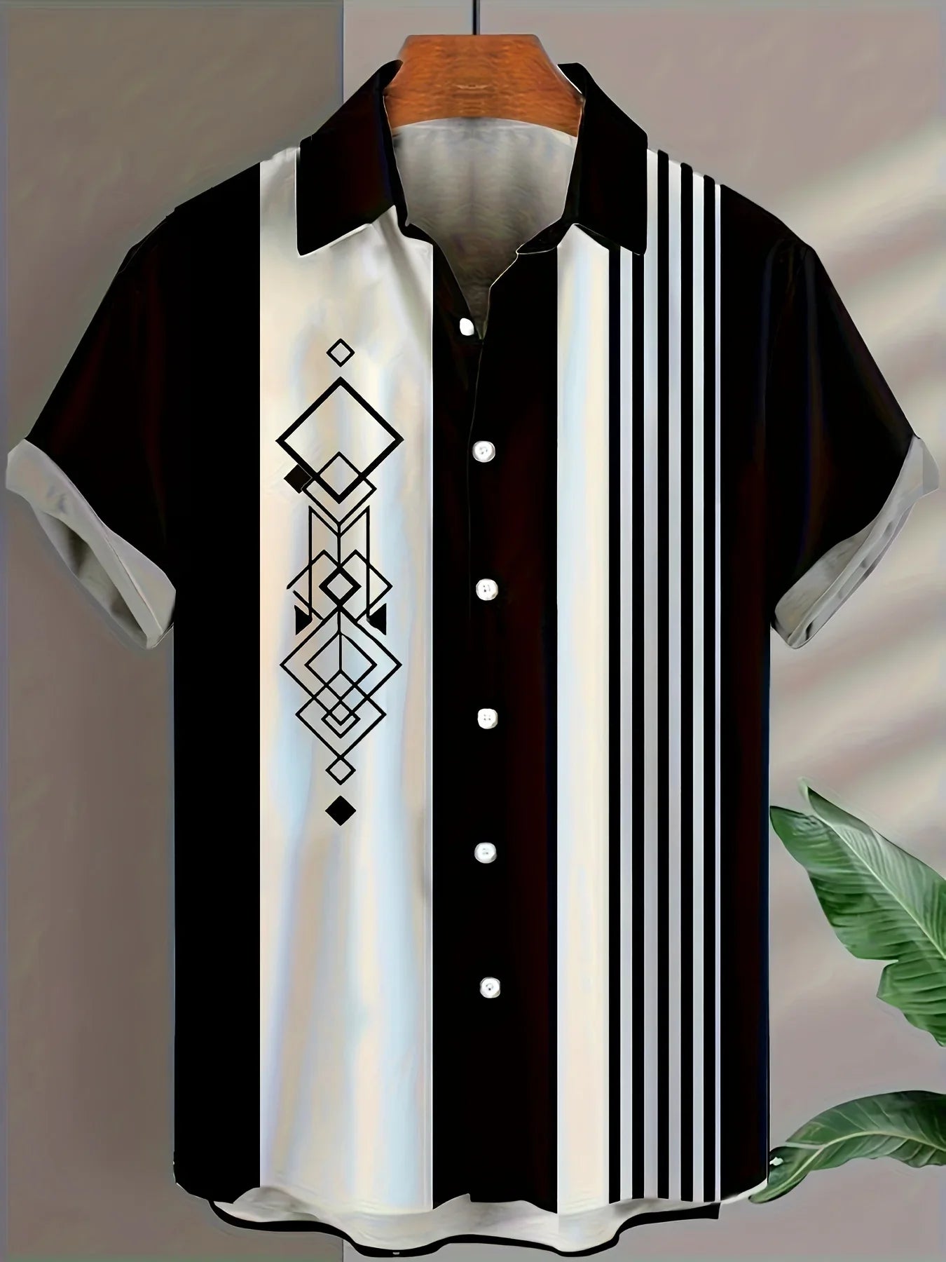 Men's short sleeve black and white button-up shirt with geometric and striped design