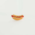 Hot dog hard enamel lapel pin with mustard and ketchup on white background