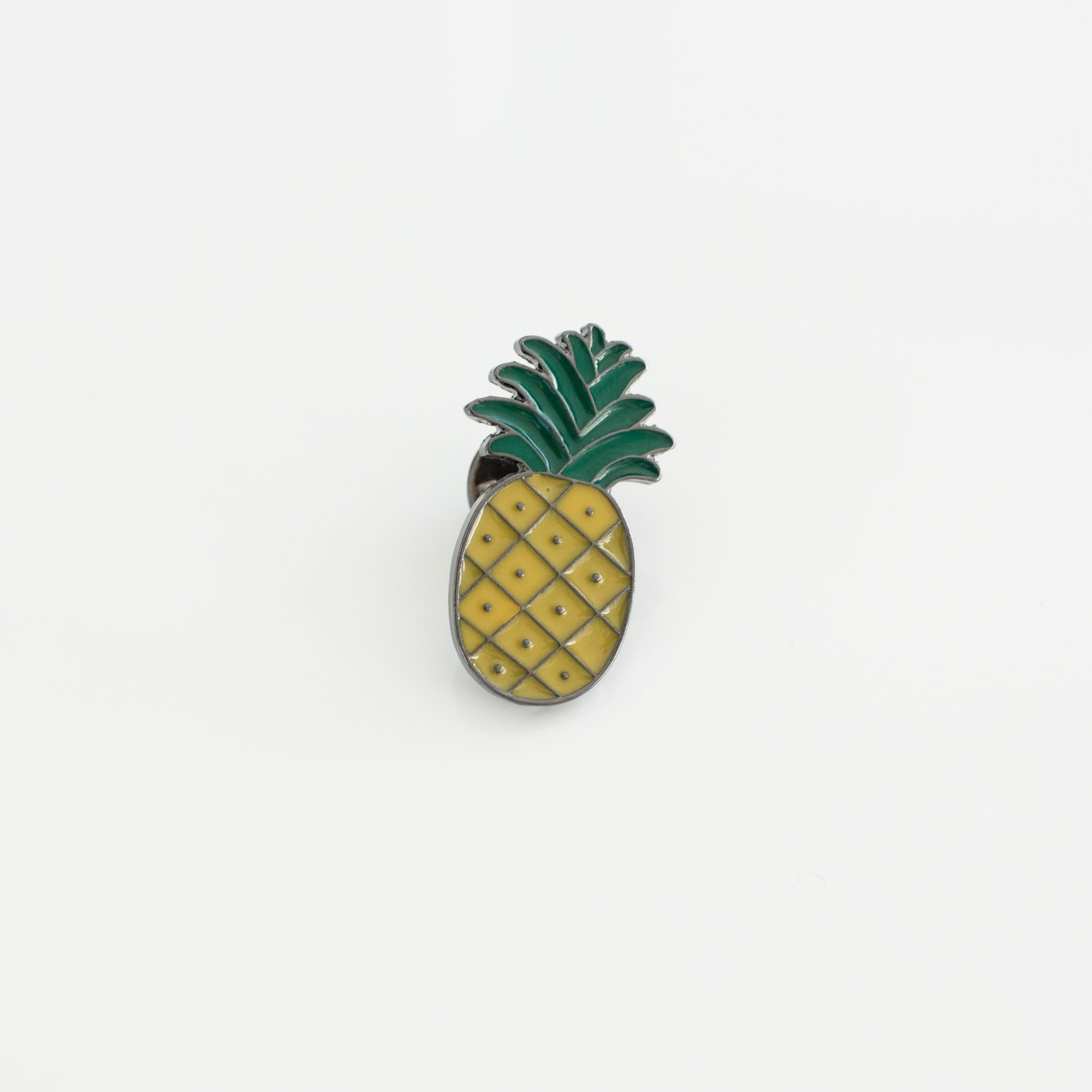 pineapple soft enamel lapel pin with yellow and green details on white background